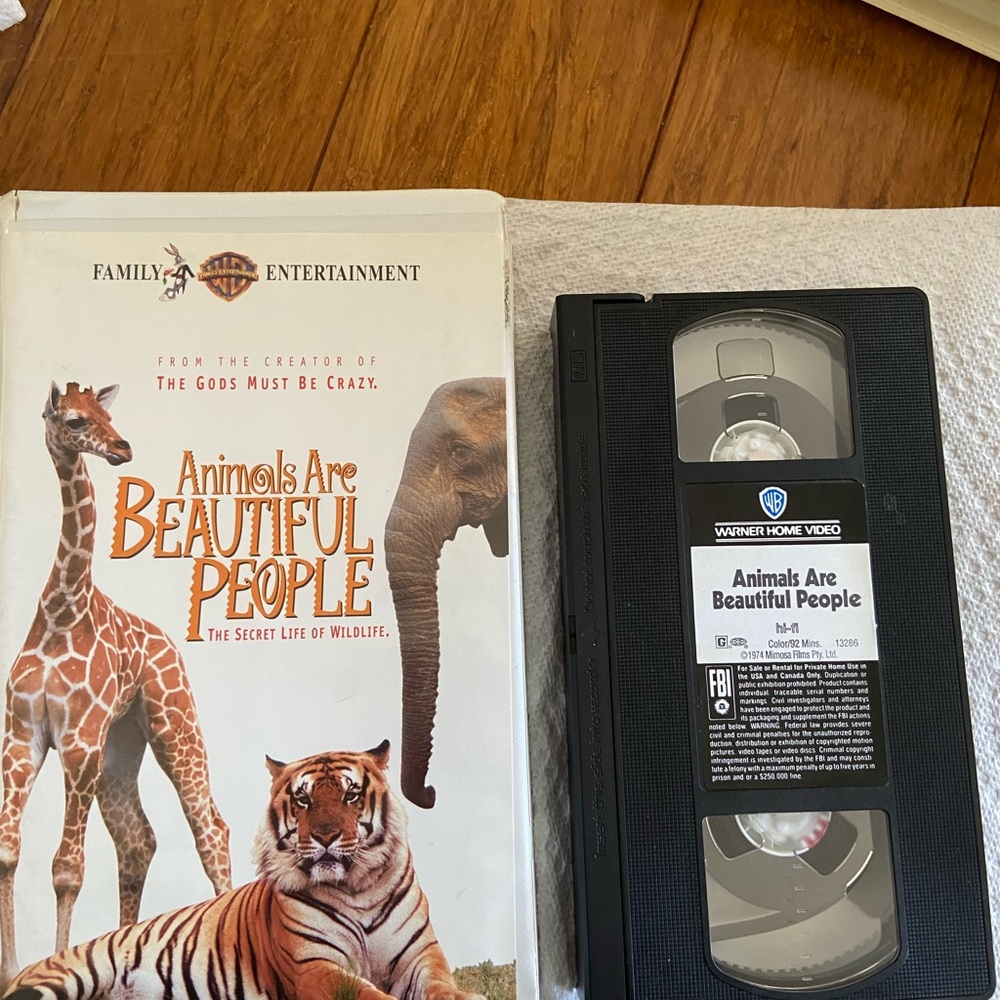 Warner Bros. VHS - Animals Are Beautiful People with Orange and Black Cover